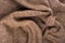 Background from light brown twisted fabric
