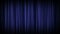 Background lighting effect of a light shining on a closed velvet curtain such as used in a cinema