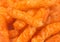 Background of Long Thin Orange Cheesy Chips