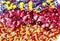 Background with a lot of delicious decorations in the form of colorful beads. Confectionery. Sweets