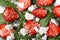 Background macro salad of strawberry , spinach, goat cheese