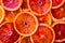 Background made of ripe juicy blood orange slices.