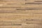 Background with many natural rustic pinewood plank timber on exterior outdoor wall.