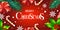 Background Merry Christmas banner, candy stick and holly berry. Horizontal Christmas posters, greeting cards, headers, website.