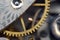 Background with metal cogwheels a clockwork, Macro