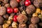 Background of a mixture of allspice for cooking different dishes, a very close-up view from above, photo stylized as an oil