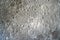 Background - moon-like surface - textured greyish with crater like areas