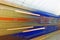 Background of motion blur of speed train in the subway. Underground vehicle dynamic motion.