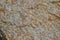 Background of mottled granite igneous rock. The texture of granite background.