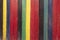 background of multi colored rough boards, red, black, yellow, blue,