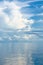 Background of ocean and blue cloudy sky