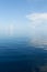 Background of ocean and blue cloudy sky
