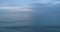 Background of the ocean water surface Aerial view Dark open sea in the evening at sunset