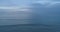 Background of the ocean water surface Aerial view Dark open sea in the evening at sunset