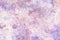 Background in old pink green violet and beige blotches, grunge texture painting in colorful distressed paper