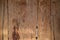 background old wooden wall that shows signs of cracking and deterioration from weather and age. Wooden wall backgrounds with