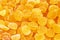 Background of orange jelly beans. Sweet food. Unhealthy concept