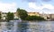 Background panoramic view of the embankment of the Vltava River from the water