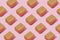 Background pattern with brown delivery boxes on magenta background