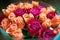 Background of peach and crimson roses. Beautiful coral roses, flowers bouquet close up. Bouquet of crimson and peach roses