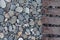 Background pebbles and wooden walkway