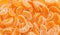 Background of peeled slices of Mandarin oranges