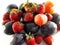 Background persimmons, plums, strawberries, harvest. Health organic food. Color texture, photo