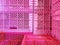 Background of Pile of Pink Plastic Baskets