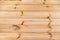 Background of planed larch planks with a beautiful pattern of the structure of trees knots. Design backgrounds texture