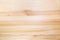 Background of plank pine light brown color with a beautiful pattern of the structure of trees knots. Design backgrounds