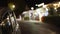 Background plate of bokeh street lights and parked car