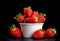 background portioned strawberries in cups