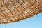 Background rattan parasol of wicker