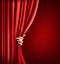 Background with red velvet curtain and hand.