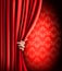 Background with red velvet curtain and hand