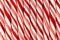 Background of red and white striped Christmas candy canes