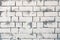 Background of retro brick wall. Texture of white brickwork. Bricks painted white and gray background