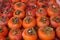 Background of ripe persimmons. Persimmon fruits are sold in the market. Persimmon is a delicious and healthy fruit. Fig persimmon
