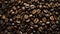 A background of roasted coffee beans. A top view picture