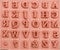 Background of rubber stamps of the English alphabetical