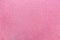 Background of rubberized coating used in children`s and sports grounds pink. Backgrounds