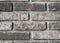 Background of rustic sandblasted bricks wall