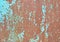 Background of rusty metal surface with cracking paint