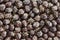 Background of savoury seasoned black olives