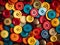 background of sewing buttons of various bright colors