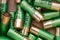 Background of shotgun cartridges for hunting rifles. Top view. Copy space