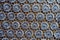 Background - silver grey crochet lacy fabric on wood