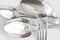 Background with silver spoons and dinner fork