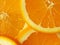 Background of sliced oranges close up