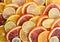 Background from slices of orange of different varieties and lime